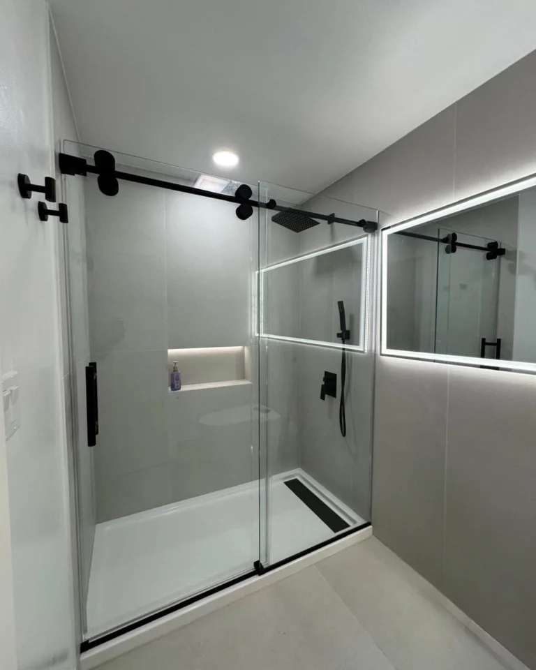 Black frameless sliding shower door